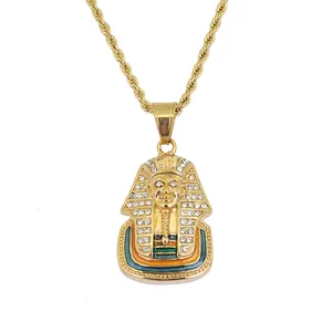 Macro detail of Egyptian Pharaoh pendant with sparkling crystals and colorful enamel details