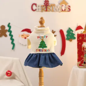 Christmas pet dress with cream knit top, denim skirt, and Merry Christmas embroidery