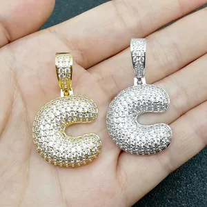 Pendente lettera C a bolla in oro e argento con micro-pavé di zirconi bianchi