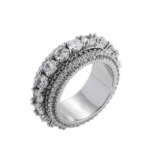 Anello rotante hip hop con cinque file di zirconi bianchi su finitura argento lucido