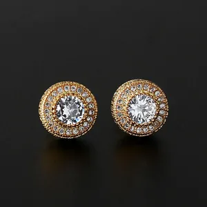 Macro detail of gold-plated halo stud earrings featuring micro-pave cubic zirconia settings