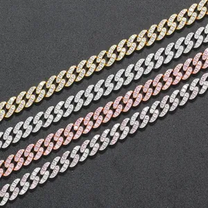 Detail of 8mm Cuban link chains with zircons in gold, silver, rose gold, and pink finishes