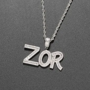 Close-up of hip hop style ZOR letter pendant with pavé cubic zirconia and rope chain