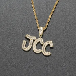 Close-up of JCC letter pendant with baguette and round cut cubic zirconia stones