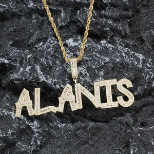 Macro shot of custom gold necklace with ALANIS name pendant and sparkling cubic zirconia