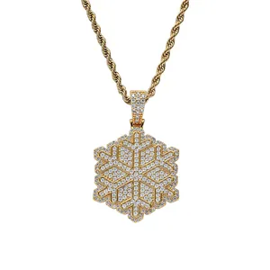 Golden snowflake pendant necklace with cubic zirconia and rope chain in hip hop style