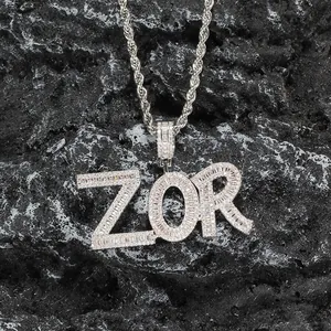 Close-up of ZOR silver pendant with baguette-cut and round crystals on rope chain