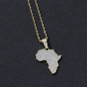 Detailed view of Africa map pendant with inlaid cubic zirconia and gold rope chain