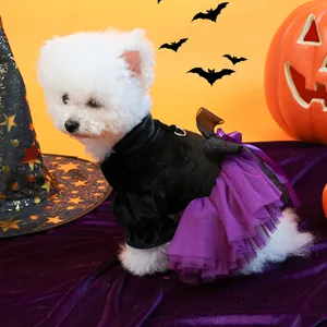 Detail of Halloween pet dress with velvet bodice, purple mesh skirt and bat wings
