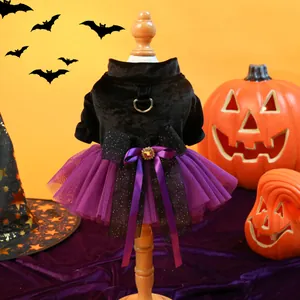 Halloween pet dress with black velvet top, purple mesh tutu and jewel bow on wooden mannequin