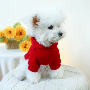 Classic bright red hooded pet sweatshirt for small white dogs in a soft cotton fabric