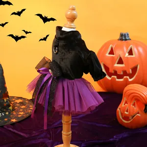 Detail of Halloween pet dress with purple tulle skirt and velvet top on small mannequin