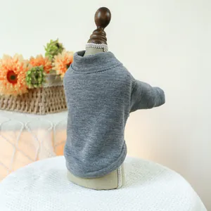 Detail view of a gray pet sweatshirt showing knit fabric texture and sleeve cuff