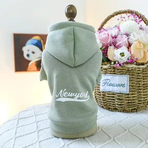 Cozy bean green hooded dog hoodie with white New York print for autumn and winter