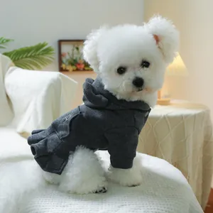 Detail of dark grey pet hoodie dress with silver embroidery and pleated hem for small dogs