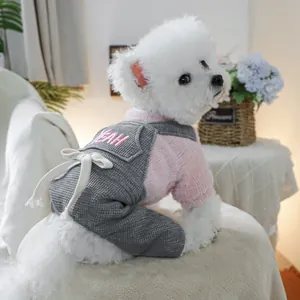 Pink textured knit sweater and grey waffle overalls with 'YEAH' embroidery for dogs