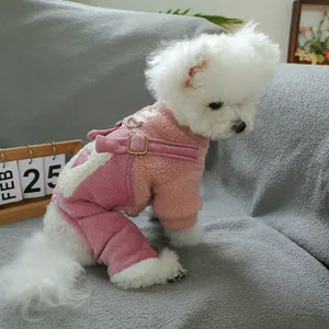 Detailed view of pink fleece pet jumpsuit with adjustable straps and traction D-ring