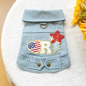 Detailed view of light blue denim pet vest featuring American star embroidery and D-ring