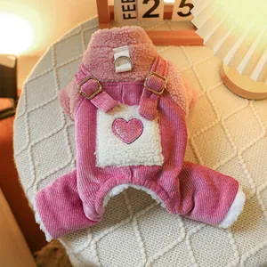 Detail of pink corduroy pet overalls with fleece lining and glitter heart motif