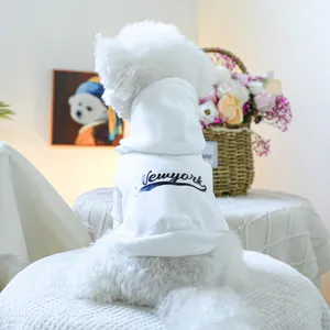 Detail of white New York hooded pet sweatshirt showing soft fabric and stylish back print