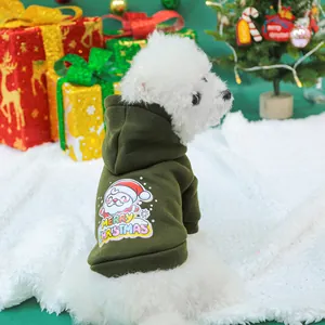 Close-up of forest green pet hoodie with Santa Claus print and Christmas gift box decor