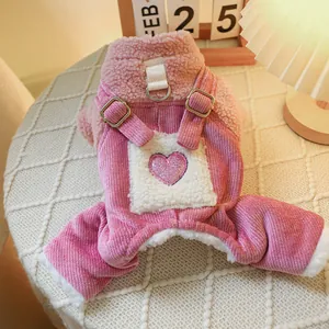 Detail of pink corduroy pet overalls with fuzzy collar and sequin heart patch