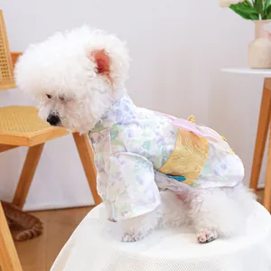 Detail of pet floral kimono dress with golden sash and bow for small dogs and cats