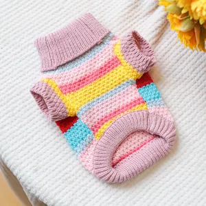 Detail of colorful striped pet sweater with thick knit texture and ribbed cuffs
