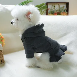 Detail of dark grey pet hoodie dress featuring cute ear hood and ruffled skirt hemline