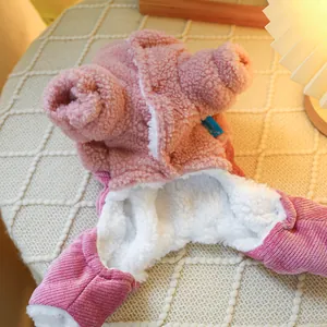 Detail of pink fleece pet sweater with soft white lining and ribbed cuffs