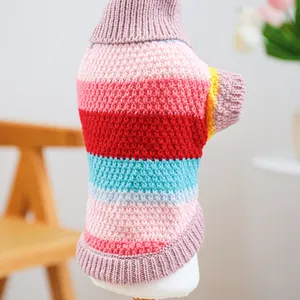 Detailed view of the colorful striped knit pattern on this thick pet sweater
