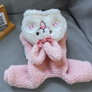 Close-up of pink lamb fleece pet jumpsuit with cat ear hood and delicate embroidery