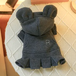 Detail of dark grey pet hoodie dress featuring cute bear ears and a pleated skirt hem