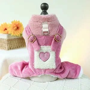 Pink corduroy pet overalls featuring a sequined heart patch and metal D-ring attachment