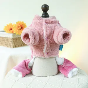 Close-up of pink fleece pet overall with warm lining and snap buttons for small dogs
