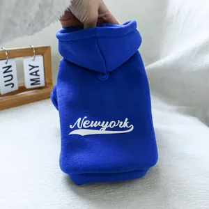 Close-up of royal blue dog hoodie with Newyork print and soft knit texture detail