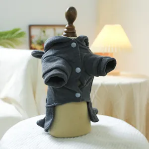 Close-up of a dark grey pet hoodie with resin snap buttons on a wooden mannequin