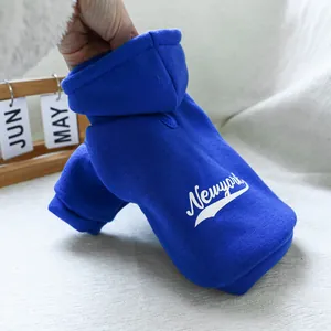 Detail of royal blue pet hoodie featuring New York print and soft knitted cotton fabric