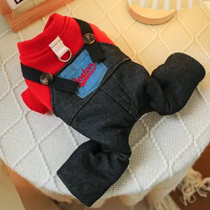 Close-up of red knit pet jumpsuit with denim overall style and metal D-ring detail