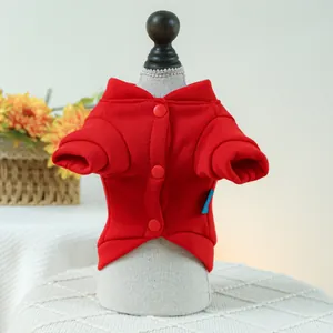 Detail of red pet cardigan with snap buttons and stand collar for small dogs and cats