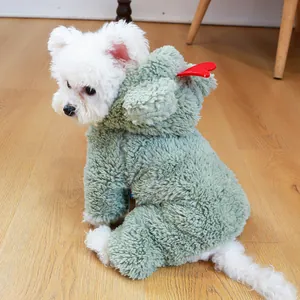 Close-up of soft green fleece pet jumpsuit with red heart detail and warm hooded design