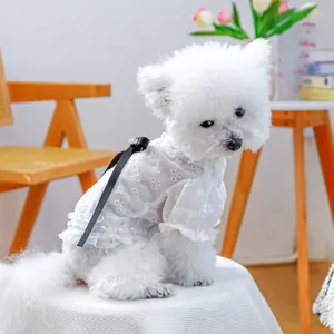 White lace dog dress with floral embroidery and black satin bow for small pets
