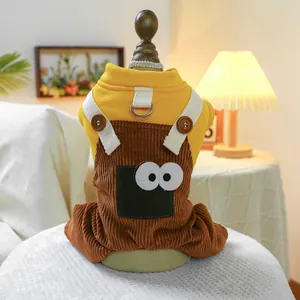 Detail of yellow knit pet jumpsuit with corduroy pants and cartoon eye pocket