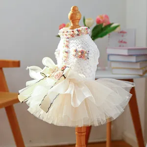 Elegant white lace pet dress for small dogs featuring floral accents and mesh tutu skirt