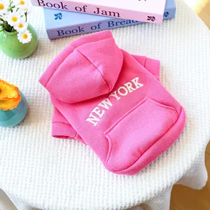 Detailed view of pink dog hoodie with New York embroidery and a functional back pocket