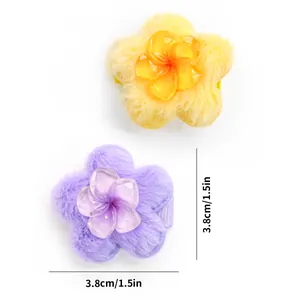 Detail showing plush flower hair clips in yellow and purple, size 3.8cm for pets