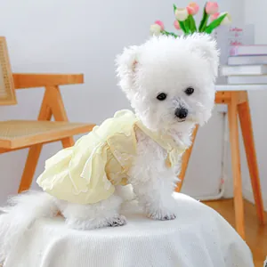 Floral yellow pet dress with white flower embroidery and pearl trim for small dogs