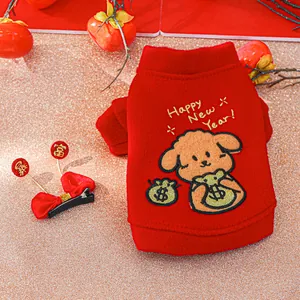 Detail of red festive pet fleece sweater with embroidery and Chinese bow hairclip