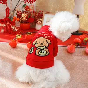 Festive red pet hoodie with Happy New Year embroidery on white dog in New Year setting