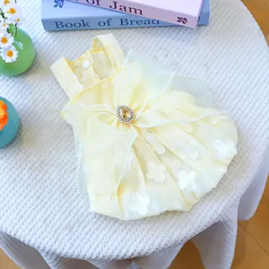 Yellow dog princess dress with large bow, pearl trim and floral pattern for small pets